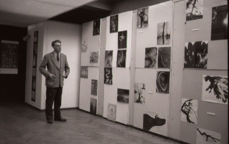 georges-andrien-view-of-the-exhibition-images-inventees-with-julien-coulommier-in-front-of-some-of-his-photographs-1957