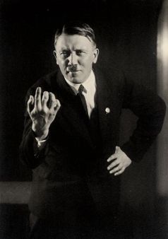 heinrich-hoffmann-posed-portrait-of-adolf-hitler-giving-a-speech-1927