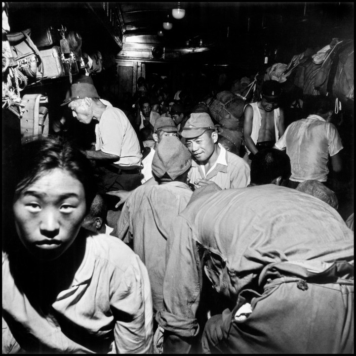 Wayne Miller Japanese soldiers and civilians crowd trains bound for Tokyo. Hiroshima, Japan. September 8, 1945
