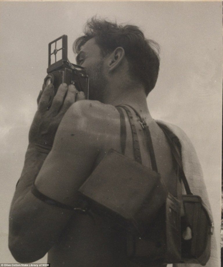 Max Dupain with his cameras by Olive Cotton from Camping trips on Culburra Beach by Max Dupain and Olive Cotton 1937