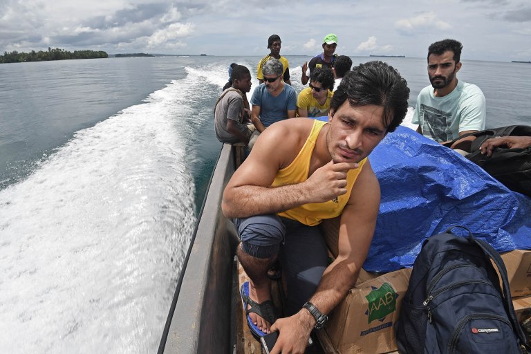 Pakistani refugee Ezatullah Kakar on the boat to the Lombrum detention centre with food and medicine