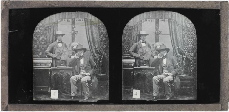 Antoine Claudet Self-portrait with His Son Henri and His Invention, the Focimeter 1851-1853 Daguerreotype, stereograph 3 1:4 × 6 7:8 × 1:8 ins (8.3 × 17.5 × 0.3 cm) (ov