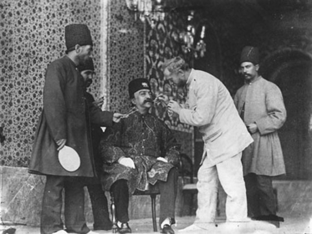 Al-Din Shah Qajar and photographer Sevryugin before photoshoot.